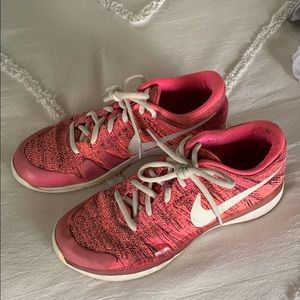 Nike tennis shoes both pair for $60